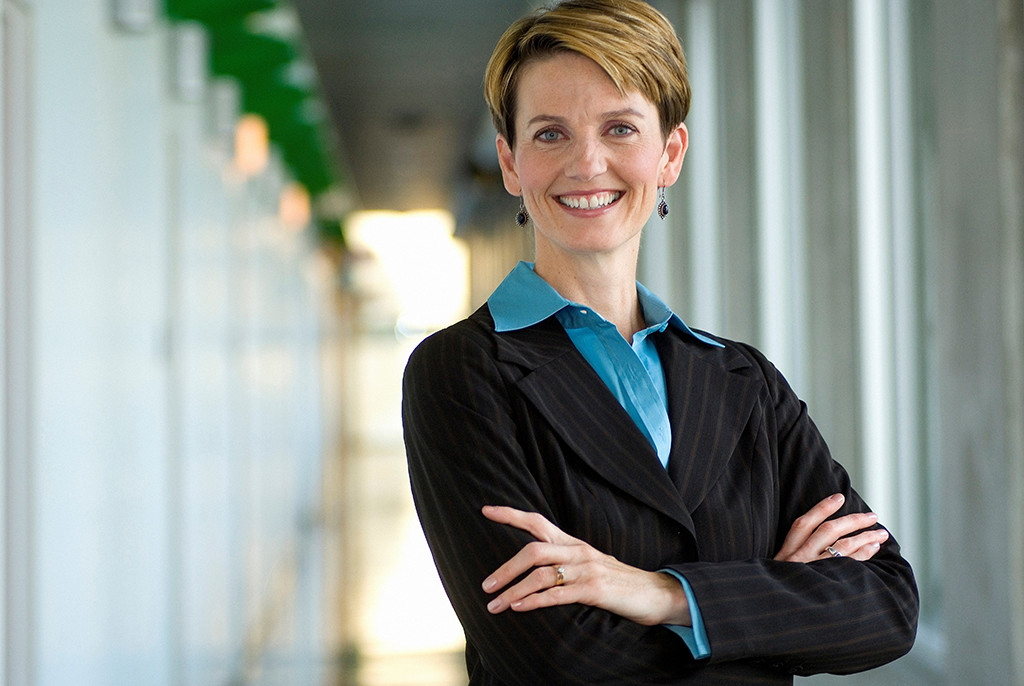 photo of a professional looking female dressed in a suit running one of the women-owned advertising agencies