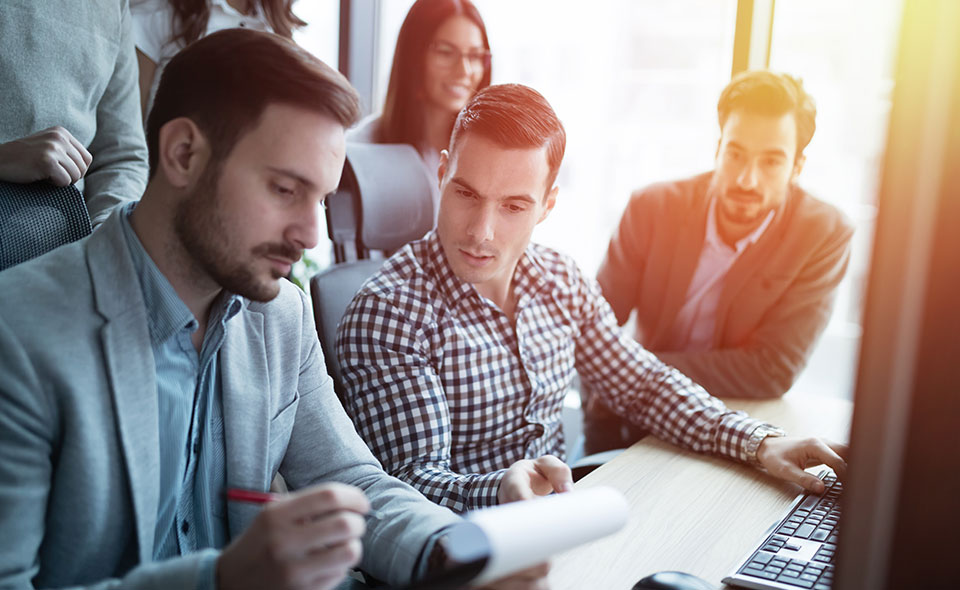 Professionals working together on an advertising strategy.